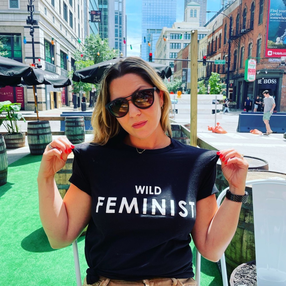 Rachel wearing a "Wild Feminist" shirt