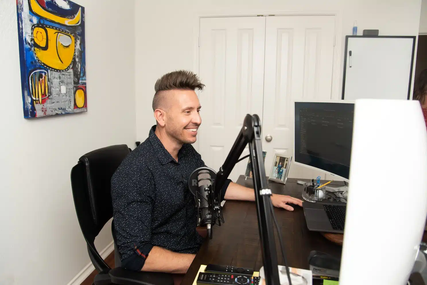 Joshua at his desk