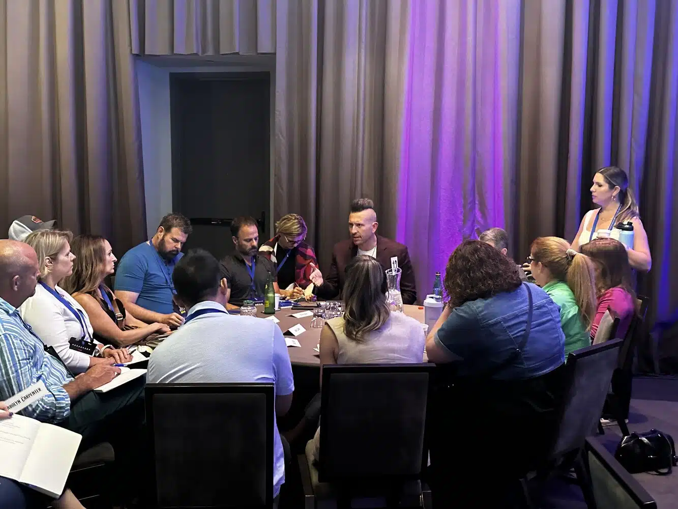 Joshua B Lee in a meeting 