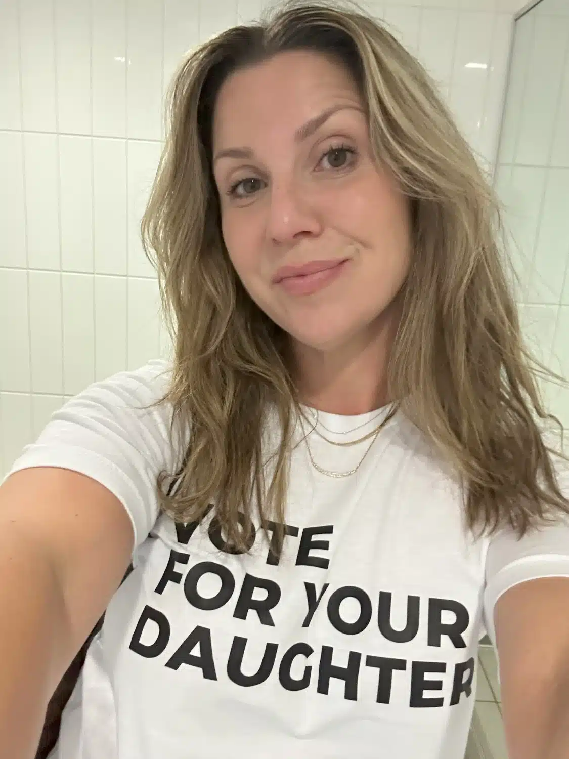 Rachel wearing Vote for Your Daughter shirt