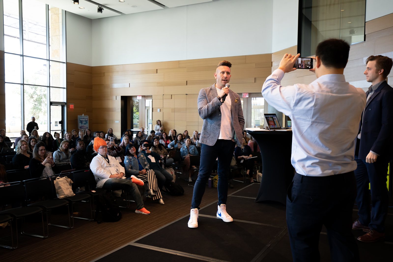 Joshua B. Lee speaking to a live audience